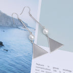 Klassinen Helmi Korvarengas ajattomalla viehätyksellä