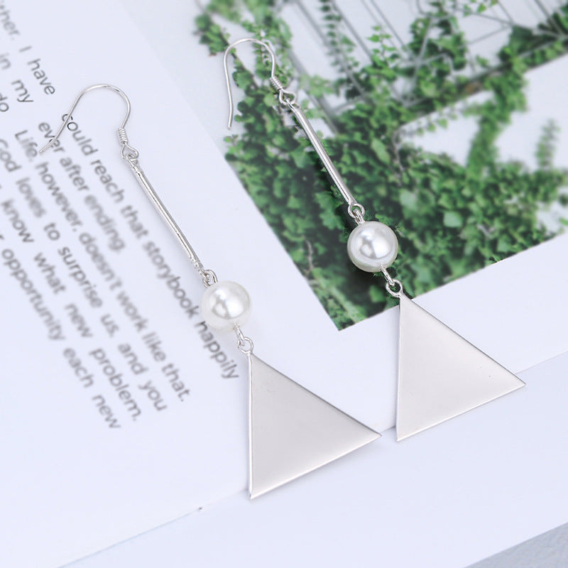 Klassinen Helmi Korvarengas ajattomalla viehätyksellä